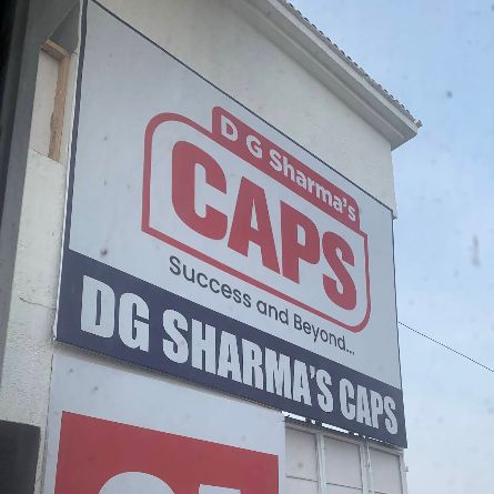 D G Sharma's CAPS logo